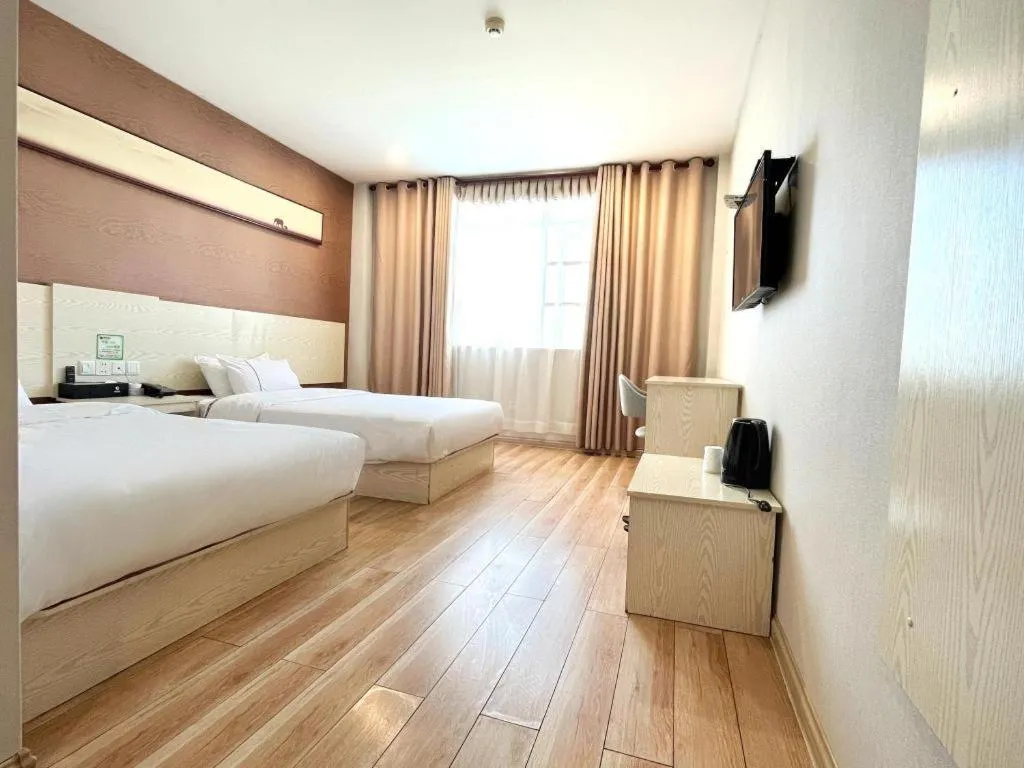 Bed in Jtour Inn Fengcheng Railway Station Jianyi Avenue Xincheng