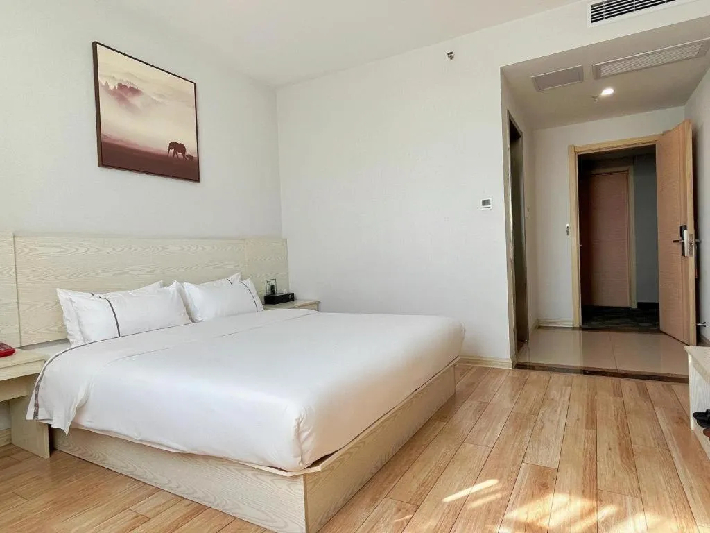 Bed in Jtour Inn Fengcheng Railway Station Jianyi Avenue Xincheng