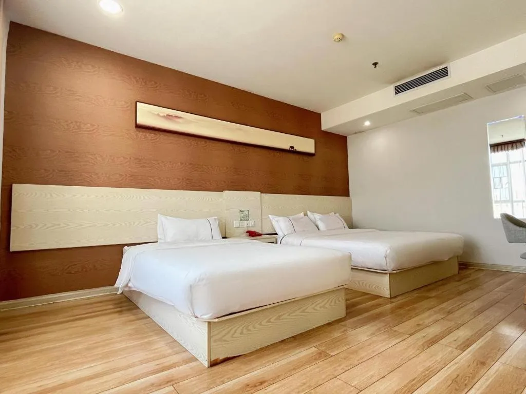 Bed in Jtour Inn Fengcheng Railway Station Jianyi Avenue Xincheng