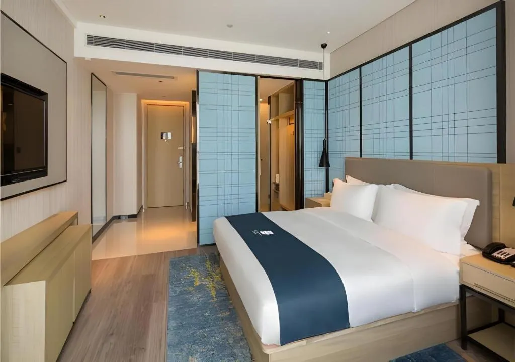 Bed in Echarm Hotel Changsha High-speed Railway Station