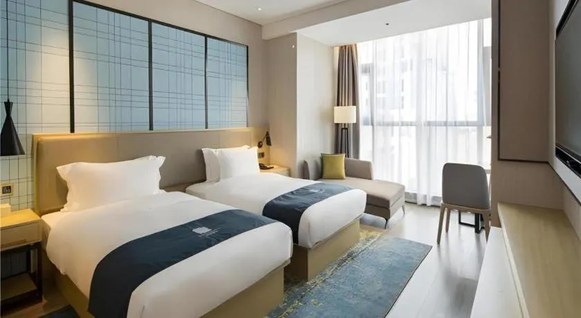Bed in Echarm Hotel Changsha High-speed Railway Station