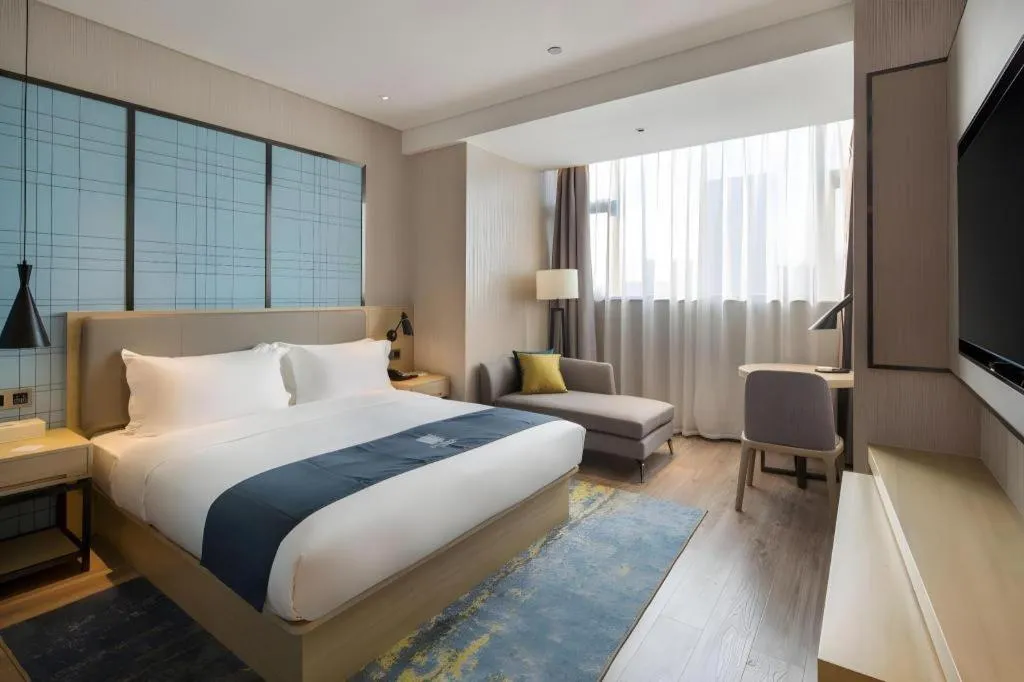 Bed in Echarm Hotel Changsha High-speed Railway Station