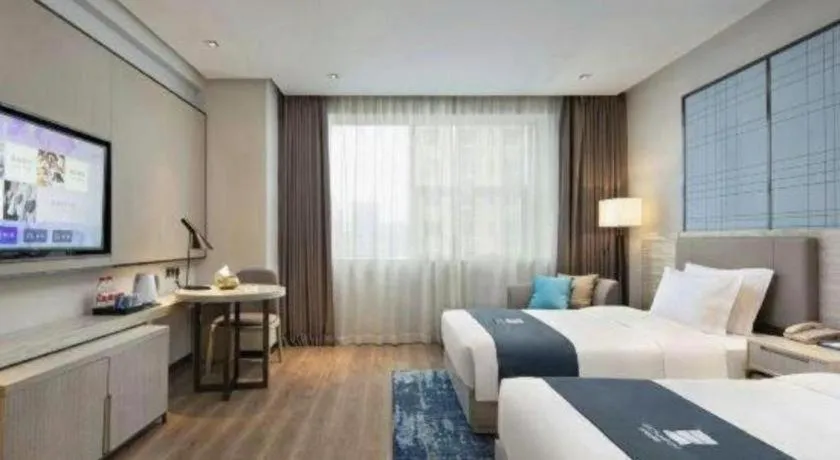 Bed in Echarm Hotel Changsha High-speed Railway Station