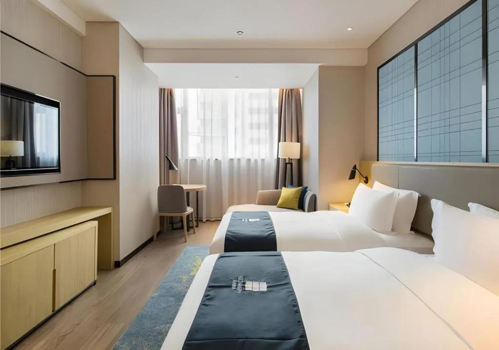 Bed in Echarm Hotel Changsha High-speed Railway Station