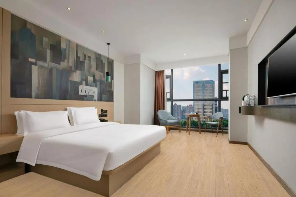 Bed in Echarm Hotel Changsha High-speed Railway Station