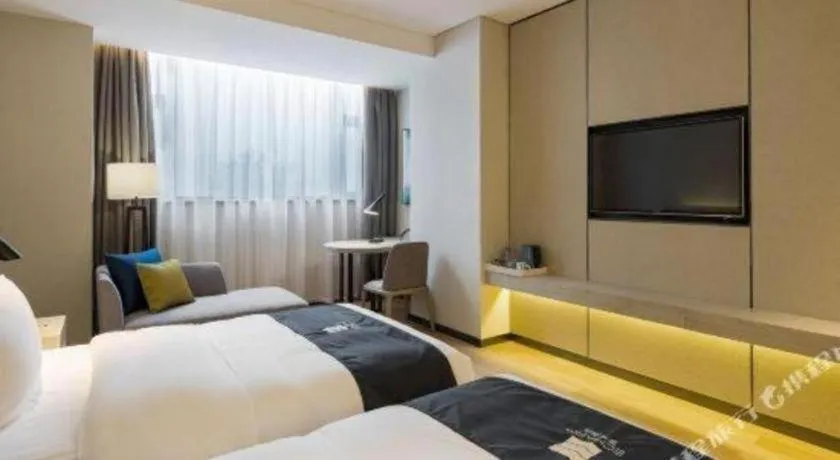 Bed in Echarm Hotel Changsha High-speed Railway Station