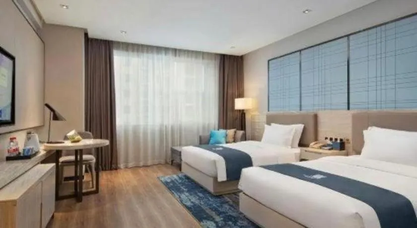 Bed in Echarm Hotel Changsha High-speed Railway Station