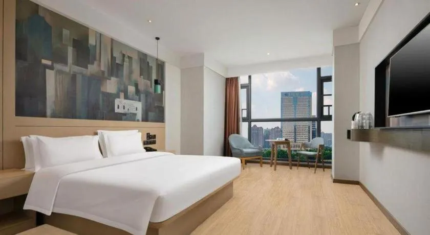 Bed in Echarm Hotel Changsha High-speed Railway Station