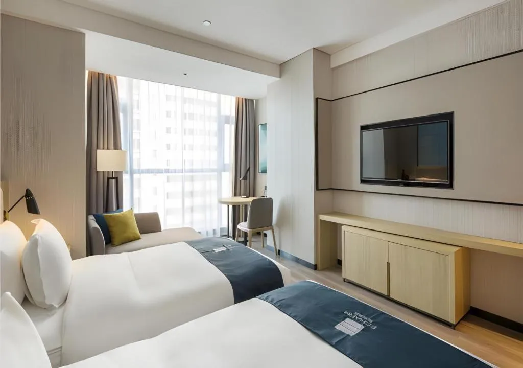 Bed in Echarm Hotel Changsha High-speed Railway Station