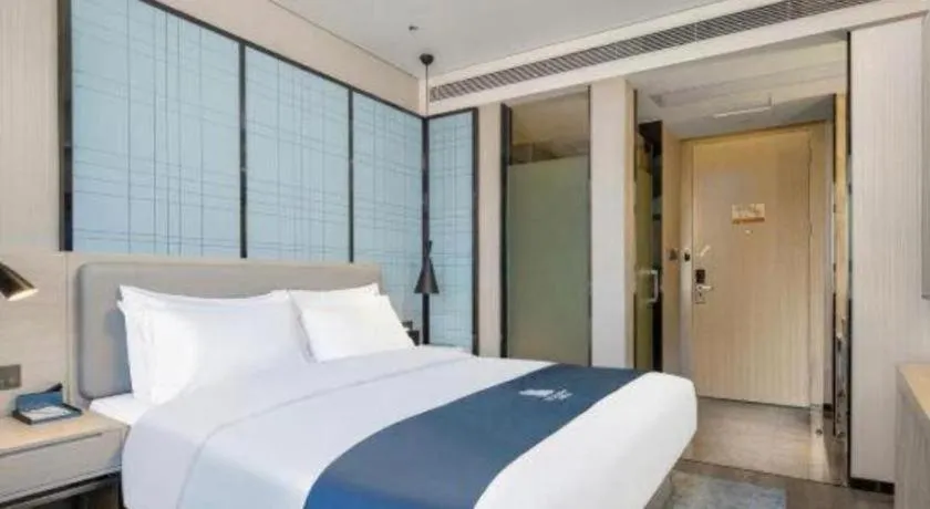 Bed in Echarm Hotel Changsha High-speed Railway Station