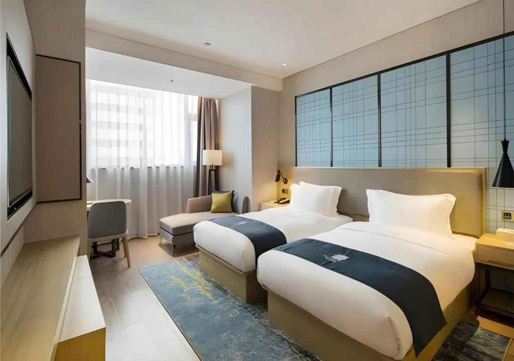 Bed in Echarm Hotel Changsha High-speed Railway Station