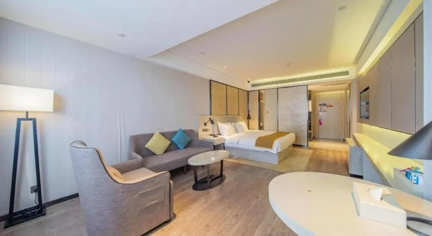 Bed in Echarm Hotel Changsha Guihua Park Metro Station