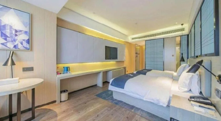 Bed in Echarm Hotel Changsha Guihua Park Metro Station