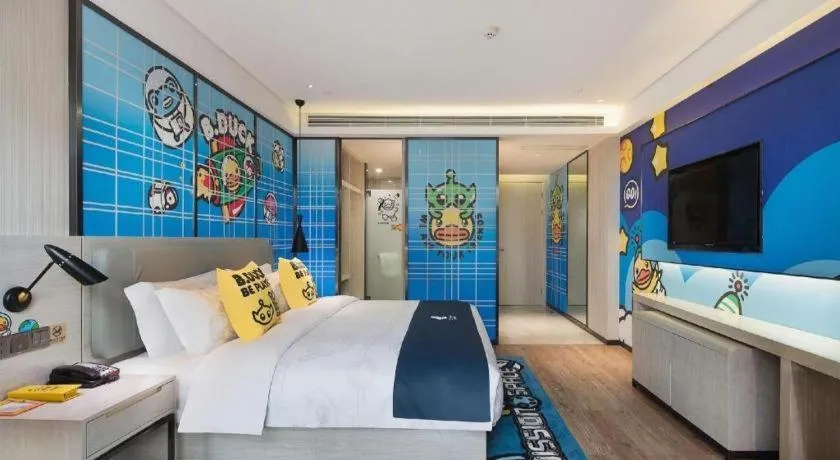 Bed in Echarm Hotel Changsha Guihua Park Metro Station