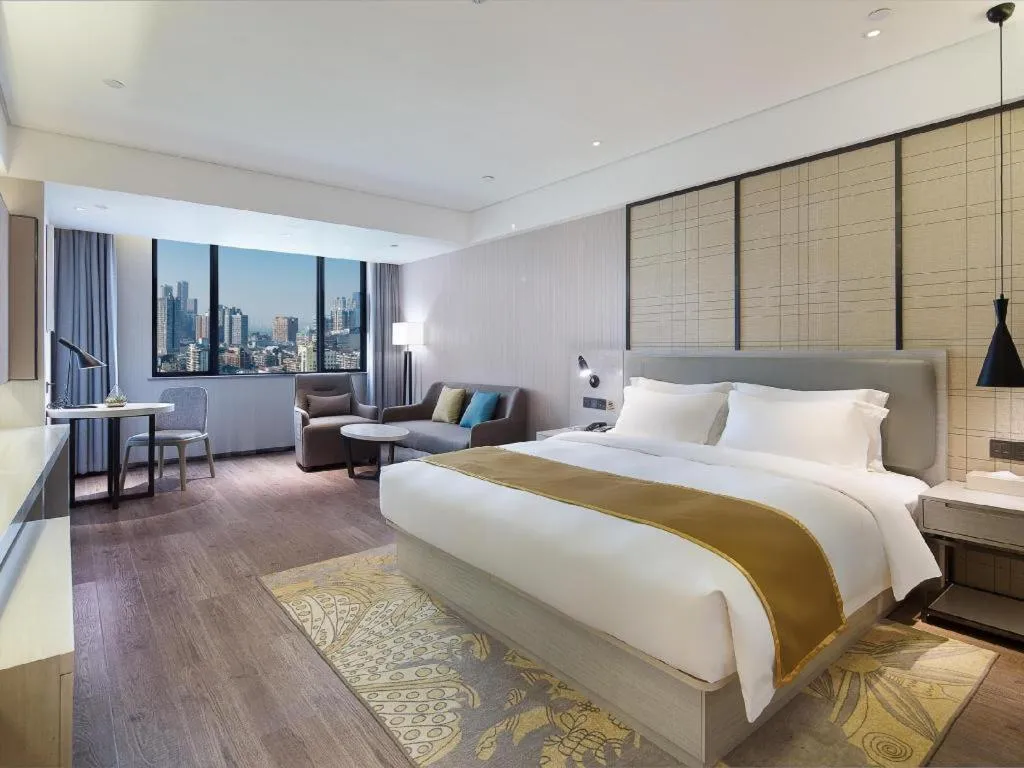 Bed in Echarm Hotel Changsha Guihua Park Metro Station