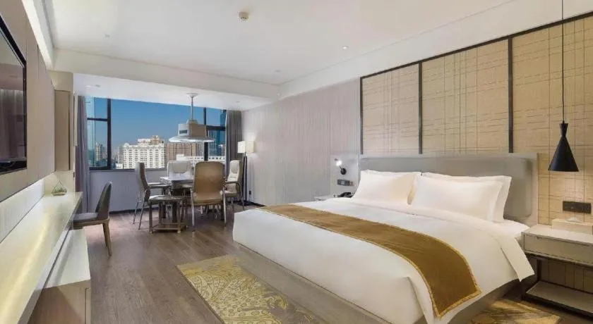 Bed in Echarm Hotel Changsha Guihua Park Metro Station