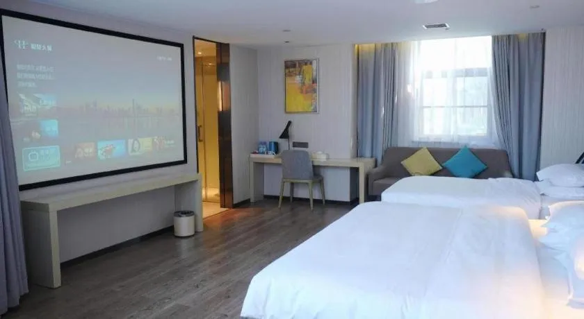 Bed in Echarm Hotel Changsha Guihua Park Metro Station