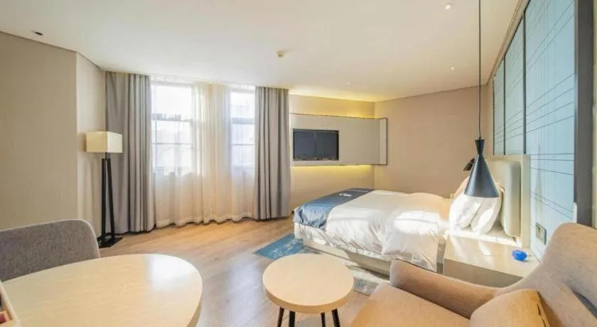 Bed in Echarm Hotel Changsha Guihua Park Metro Station