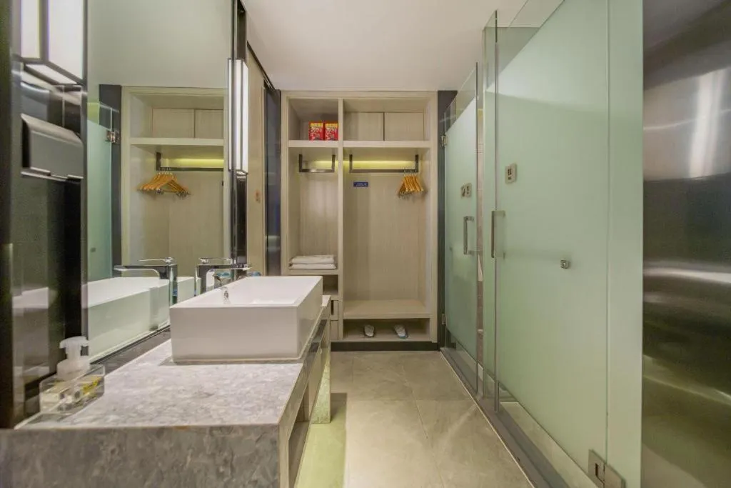 Bed in Echarm Hotel Changsha Guihua Park Metro Station