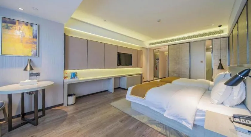 Bed in Echarm Hotel Changsha Guihua Park Metro Station