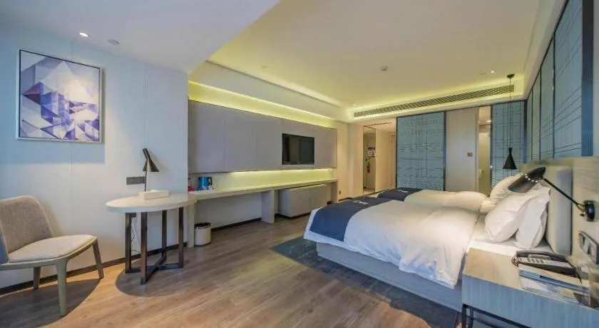 Bed in Echarm Hotel Changsha Guihua Park Metro Station