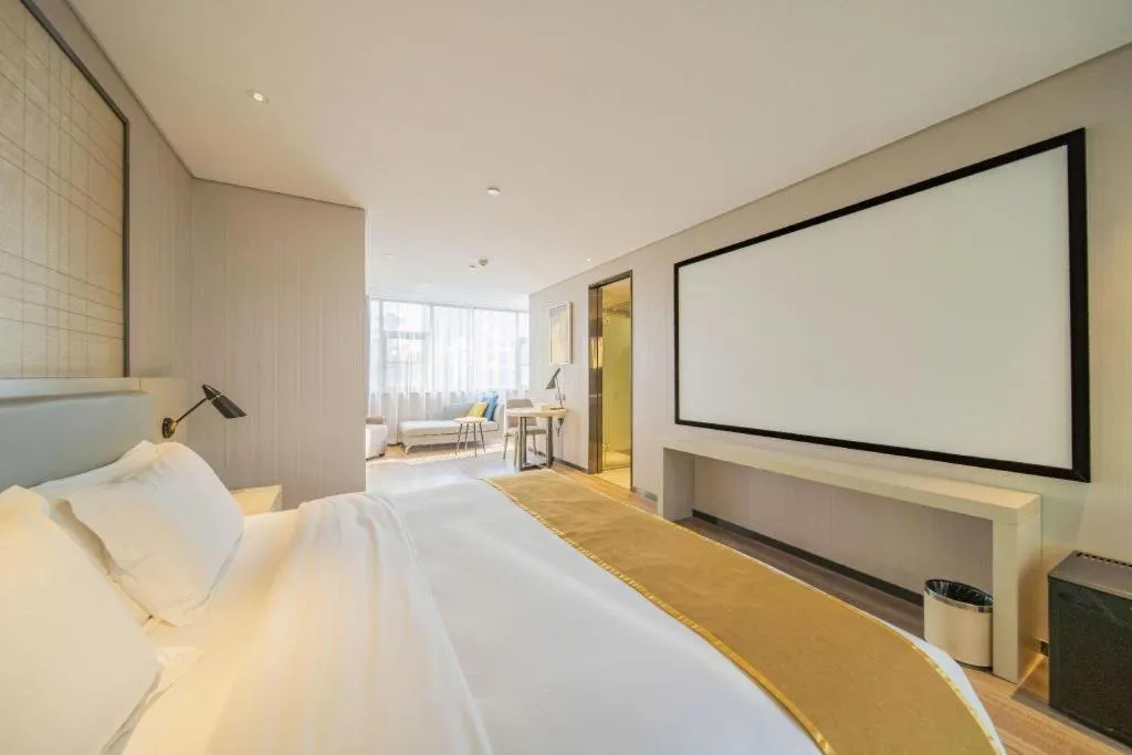 Bed in Echarm Hotel Changsha Guihua Park Metro Station