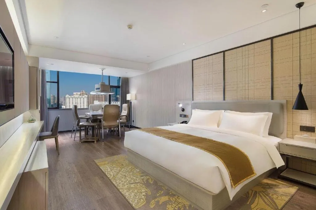 Bed in Echarm Hotel Changsha Guihua Park Metro Station