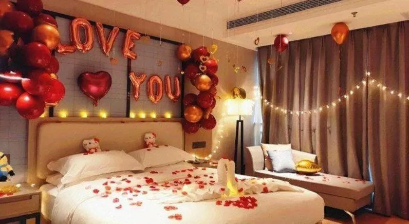 Bed in Echarm Hotel Xinyu Railway Station Baoshi Park