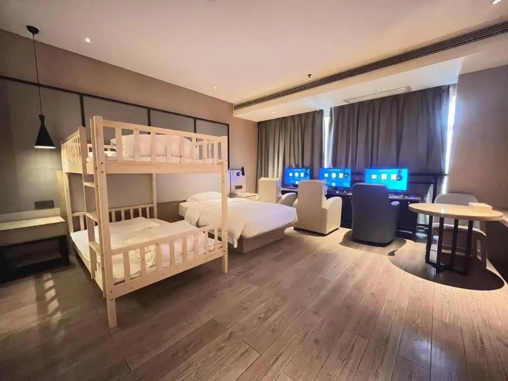 Bed in Echarm Hotel Xinyu Railway Station Baoshi Park