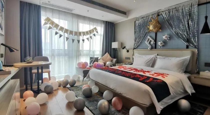 Bed in Echarm Hotel Xinyu Railway Station Baoshi Park