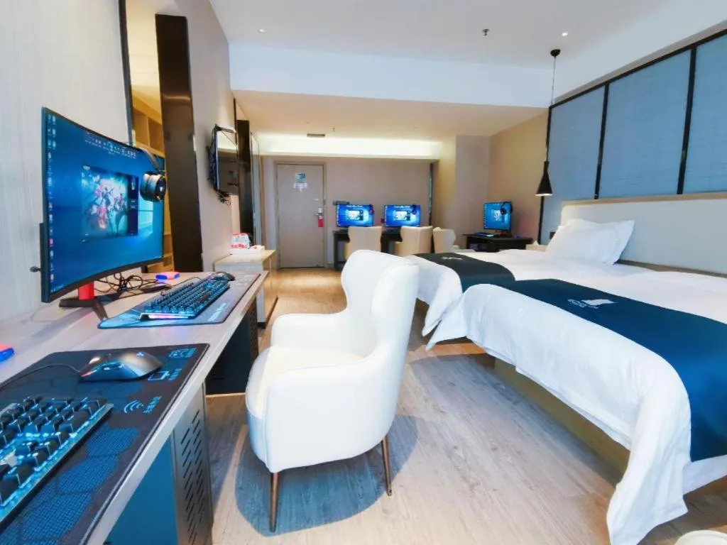 Bed in Echarm Hotel Xinyu Railway Station Baoshi Park