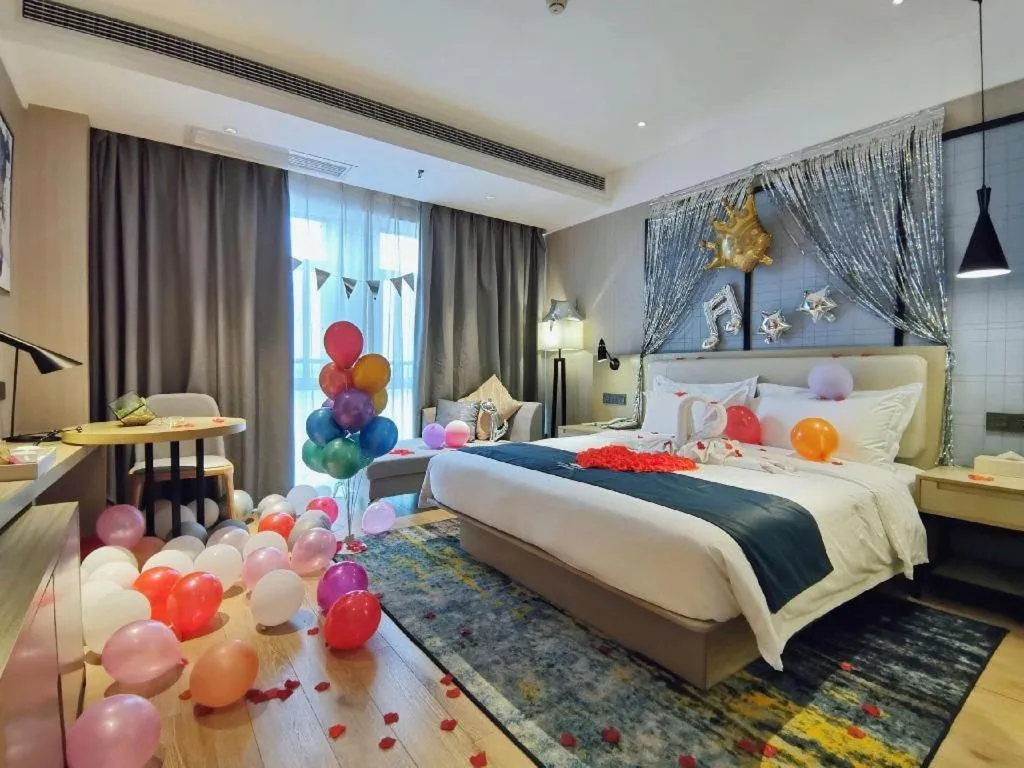 Bed in Echarm Hotel Xinyu Railway Station Baoshi Park