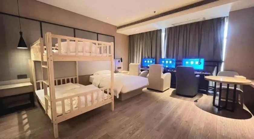 Bed in Echarm Hotel Xinyu Railway Station Baoshi Park