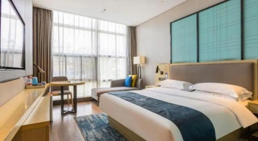 Bed in Echarm Hotel Nanjing Jiangning Tianyin Avenue Metro Station