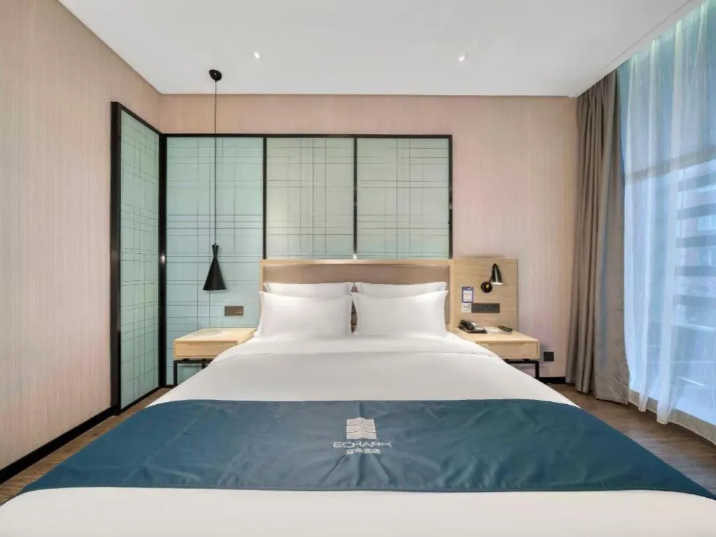 Bed in Echarm Hotel Nanjing Jiangning Tianyin Avenue Metro Station