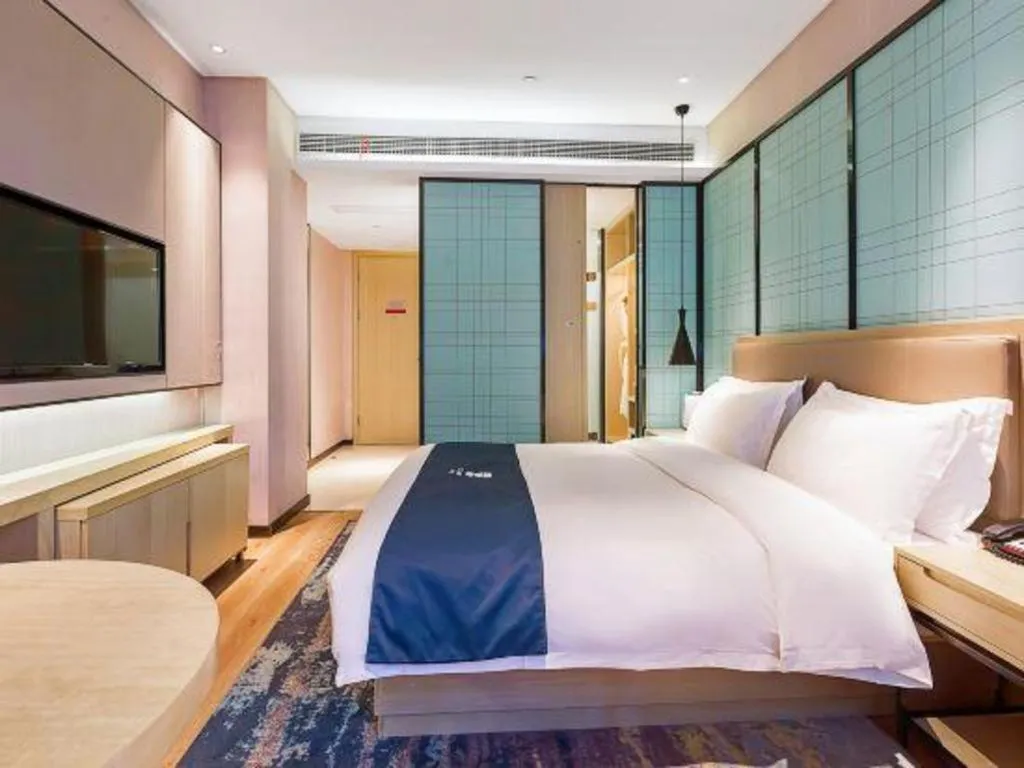 Bed in Echarm Hotel Nanjing Jiangning Tianyin Avenue Metro Station