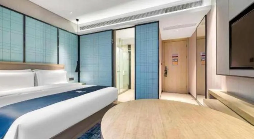 Bed in Echarm Hotel Nanjing Jiangning Tianyin Avenue Metro Station