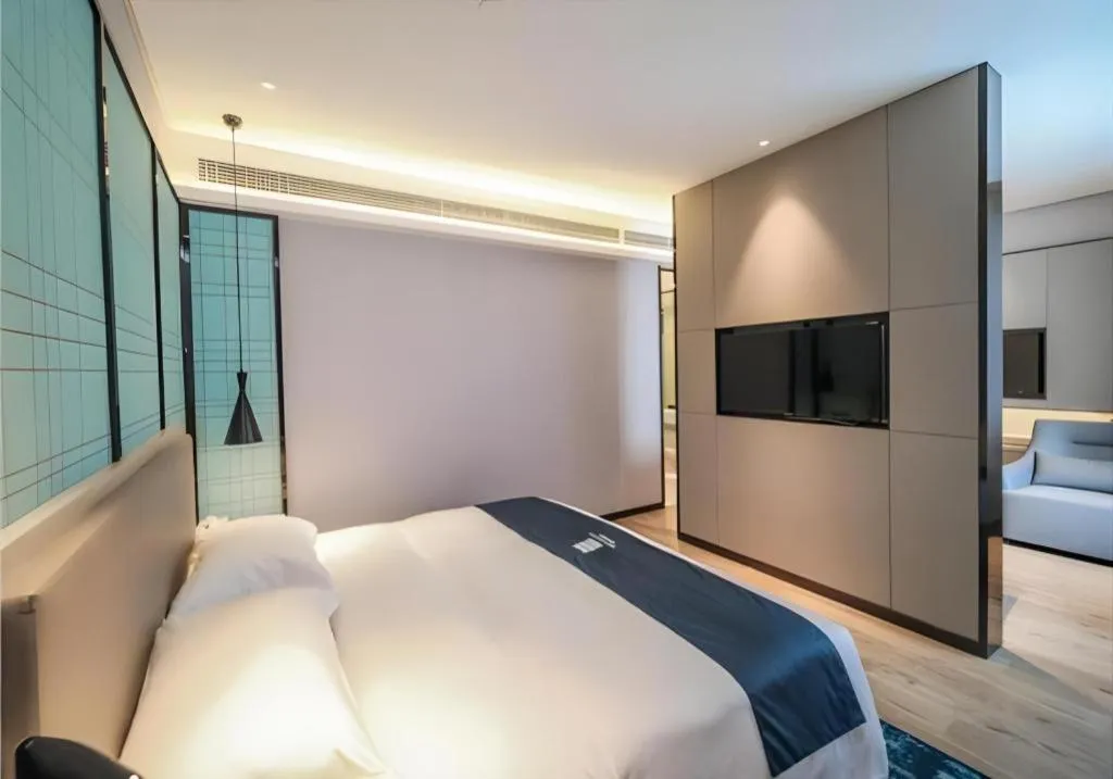 Bed in Echarm Hotel Nanjing Jiangning Tianyin Avenue Metro Station