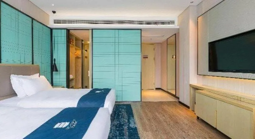 Bed in Echarm Hotel Nanjing Jiangning Tianyin Avenue Metro Station