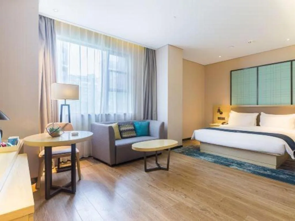 Bed in Echarm Hotel Nanjing Jiangning Tianyin Avenue Metro Station