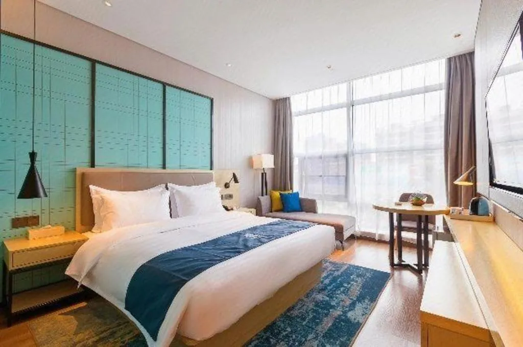 Bed in Echarm Hotel Nanjing Jiangning Tianyin Avenue Metro Station