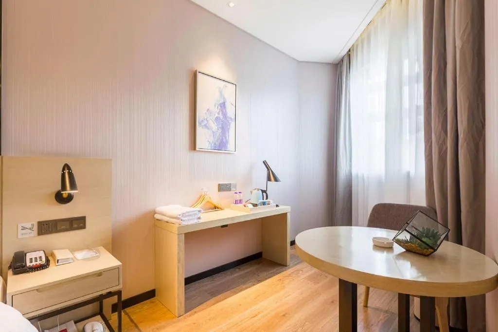 Bed in Echarm Hotel Nanjing Jiangning Tianyin Avenue Metro Station