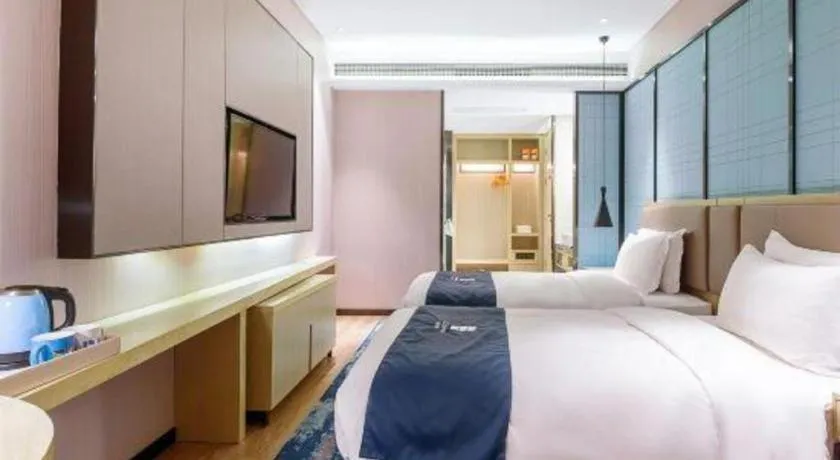 Bed in Echarm Hotel Nanjing Jiangning Tianyin Avenue Metro Station