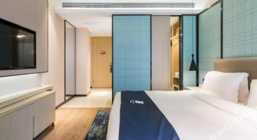 Bed in Echarm Hotel Nanjing Jiangning Tianyin Avenue Metro Station