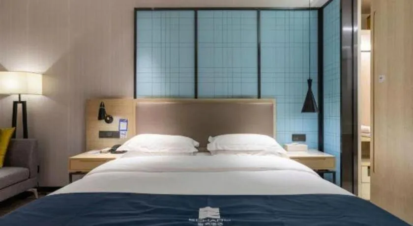 Bed in Echarm Hotel Nanjing Jiangning Tianyin Avenue Metro Station