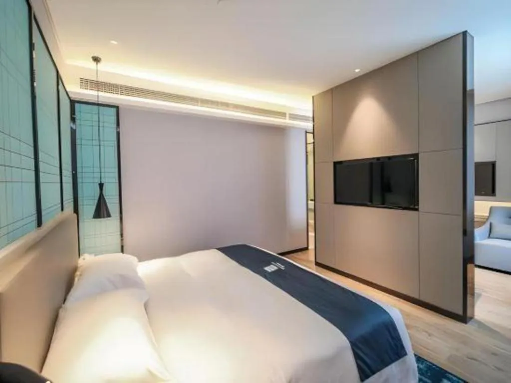 Bed in Echarm Hotel Nanjing Jiangning Tianyin Avenue Metro Station