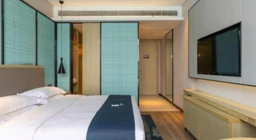Bed in Echarm Hotel Nanjing Jiangning Tianyin Avenue Metro Station