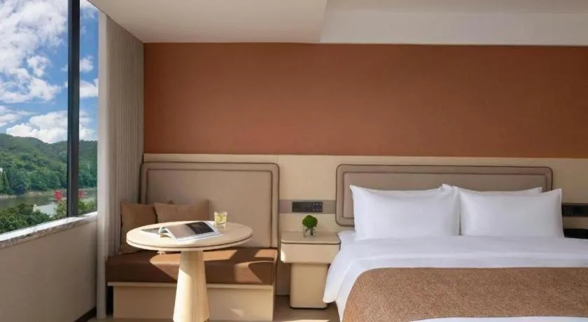 Bed in Immersing Hotel Guilin Two Rivers and Four Lakes Dongxi Alley