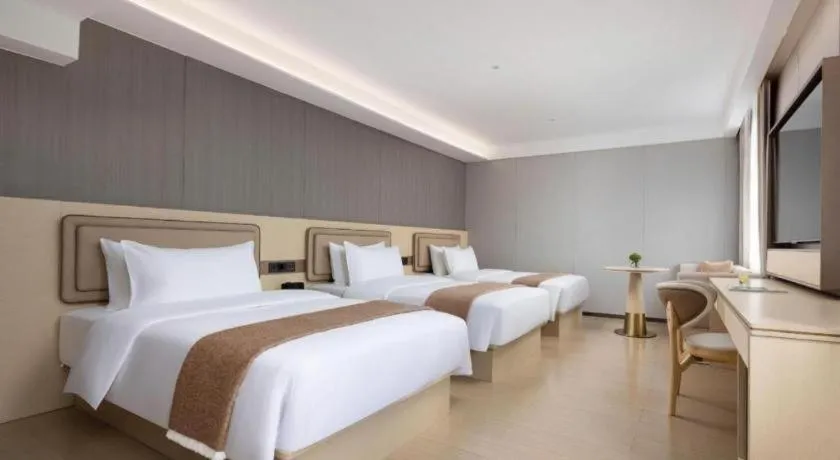 Bed in Immersing Hotel Guilin Two Rivers and Four Lakes Dongxi Alley