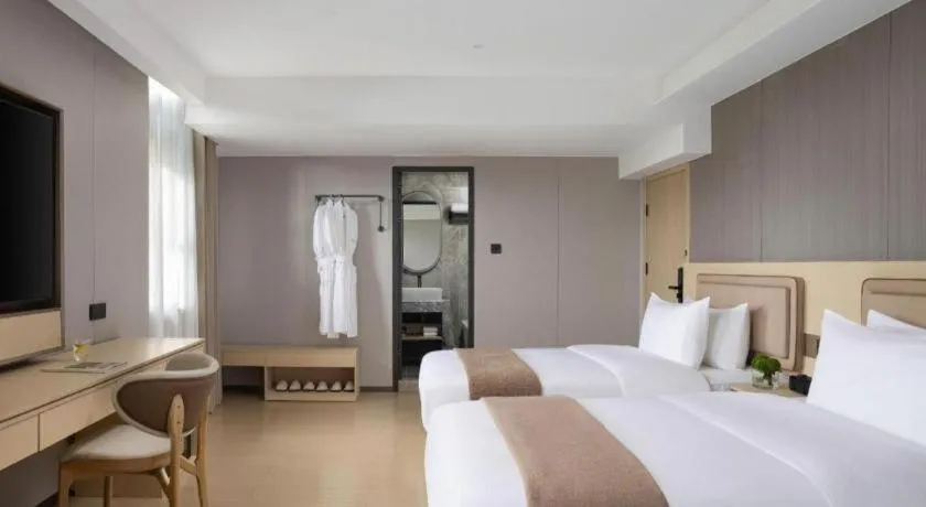 Bed in Immersing Hotel Guilin Two Rivers and Four Lakes Dongxi Alley